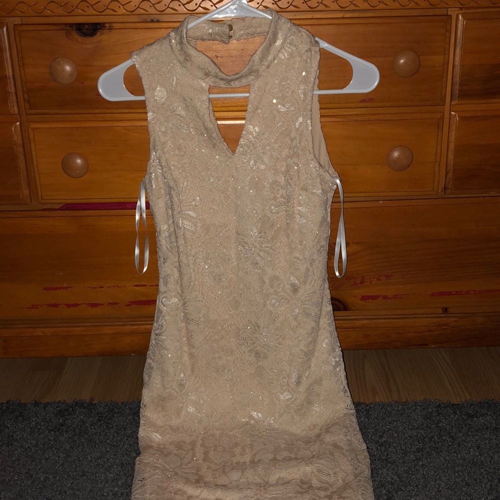 beige dress with sparkles and pattern